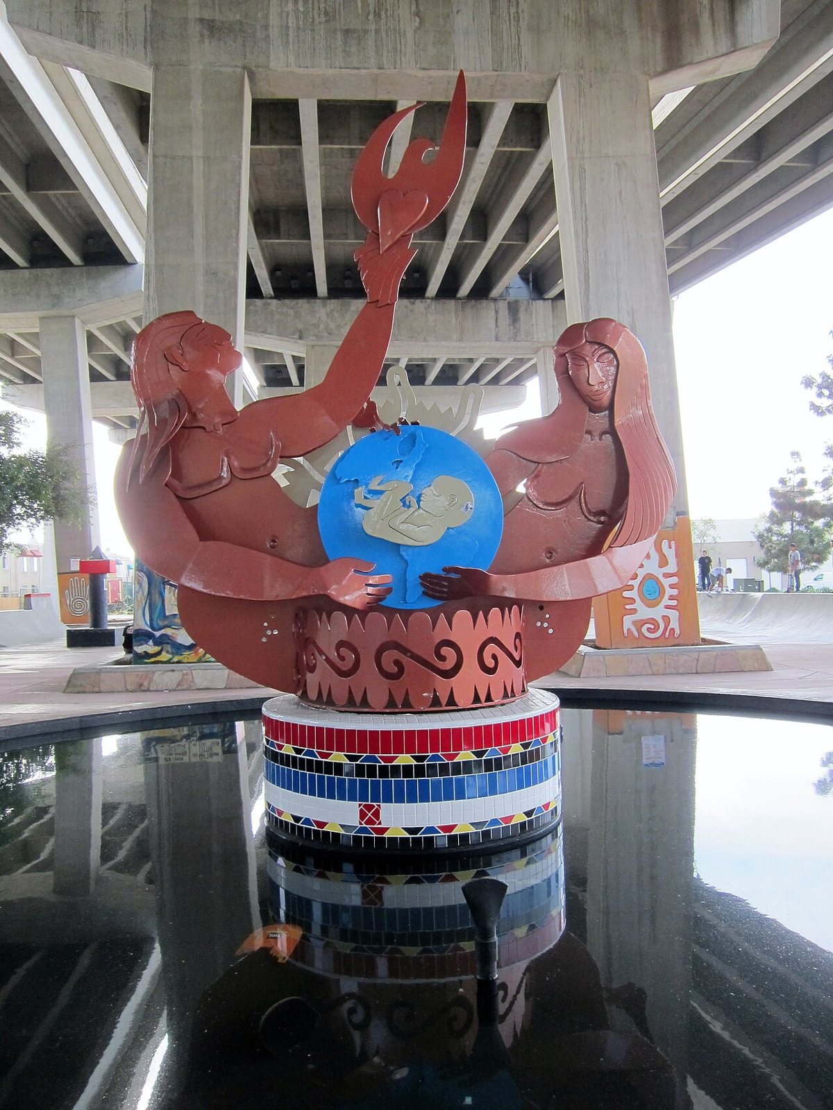 murals painted on bridge pylons at Chicano Park under the Coronado Bridge