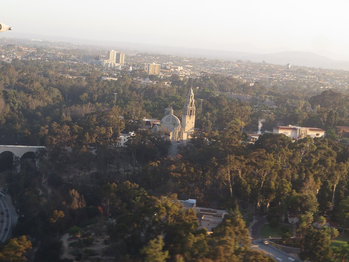 hillside park with open grass overlooking Mission Bay and the Pacific coastline