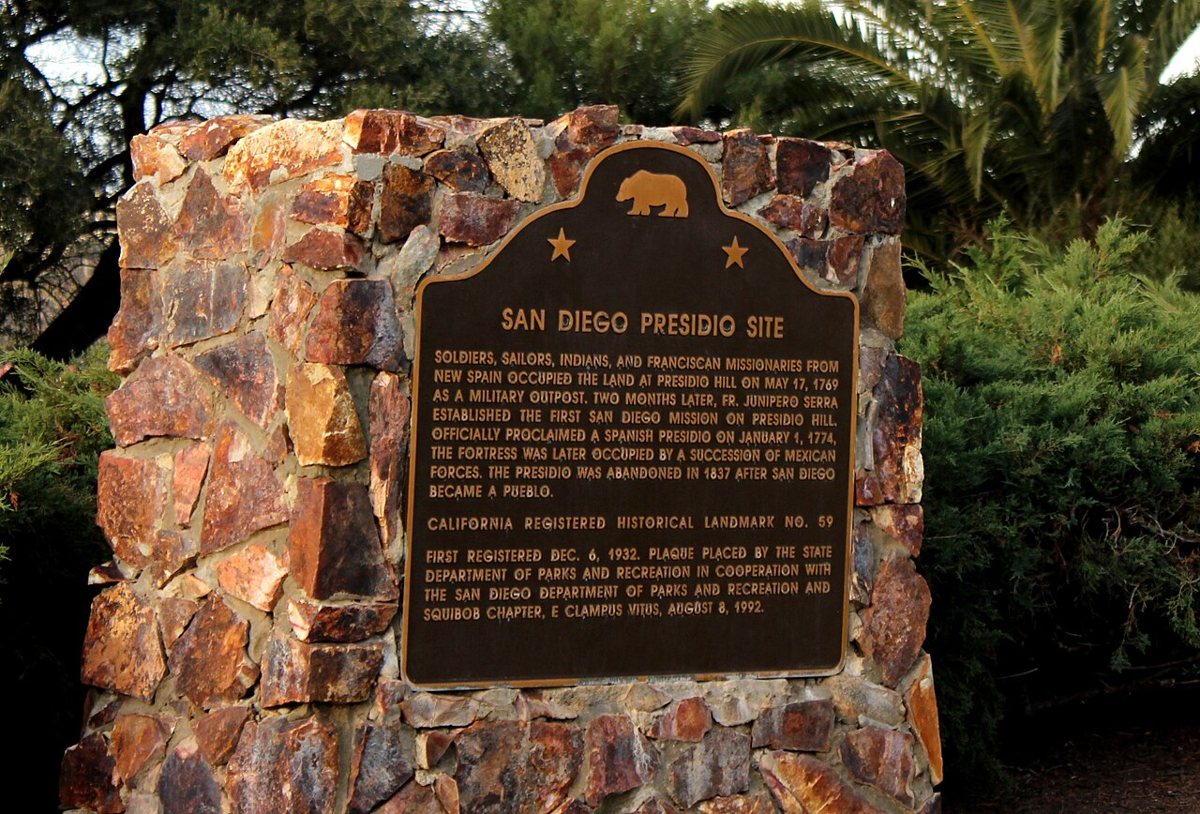 hillside park with palm trees and the Junipero Serra Museum overlooking Old Town